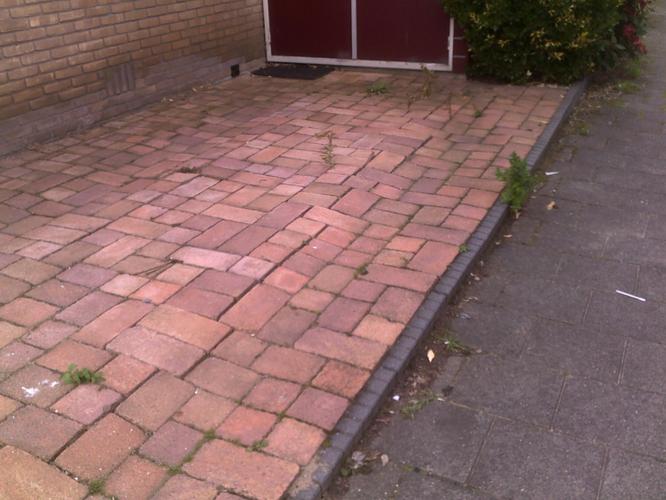 Verzakking in bestrating en ondergrond